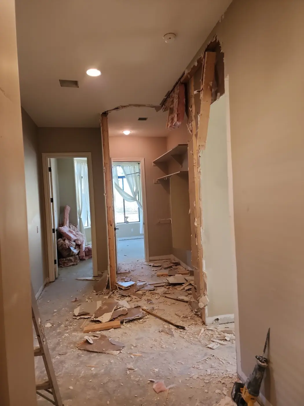 Selective wall and closet demolition in progress